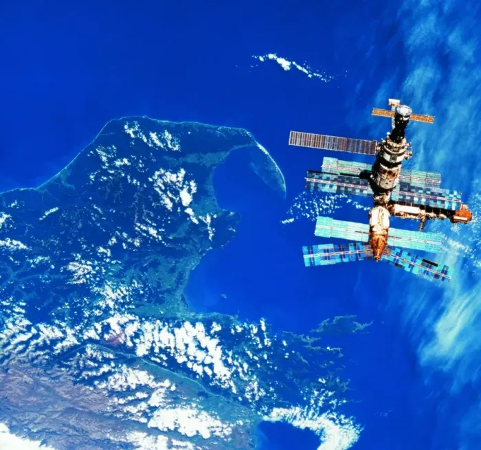 Framed Print : A space station orbiting above earth Framed Print : A space station orbiting above earth