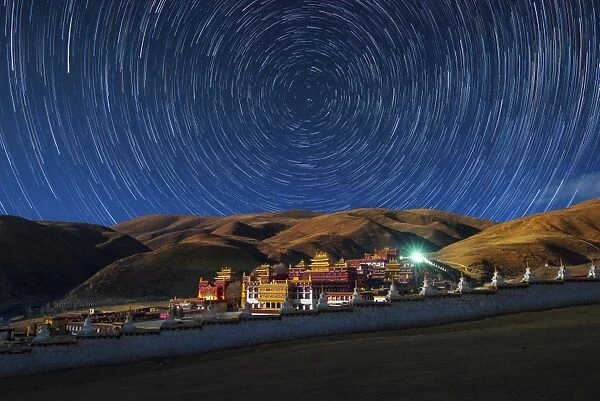 Star trails over Litang temple
