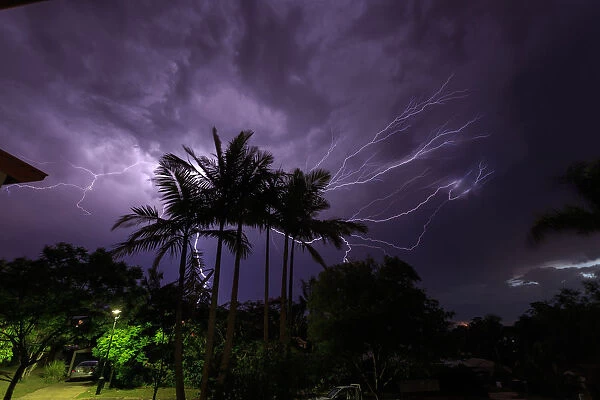 Suburban Lightning. Lightning bolts over city suburb