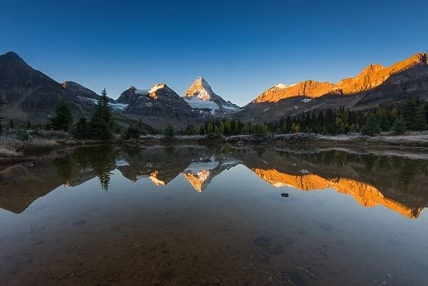 Sunrise at Mount Assiniboine with reflection