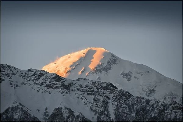 A sunrise over the mountains in Dzarkot, Western Himalayas, Nepal