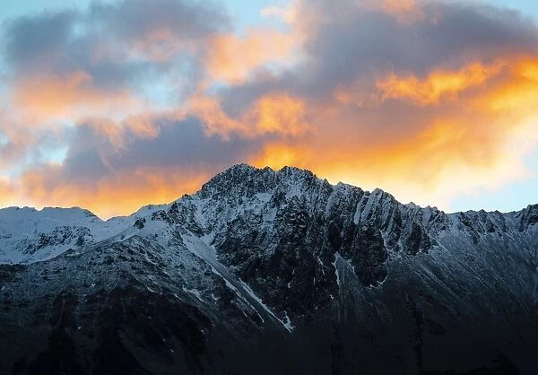 Sunrise over the snow covered mountains