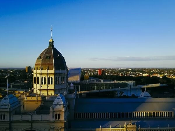 Sunset Aerial view of north Melbourne and the exhibition centre, Carlton gardens, Victoria
