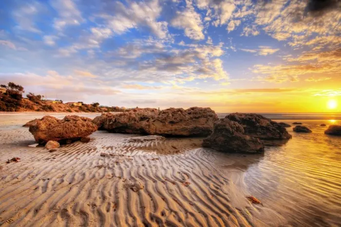 Framed Print : Sunset with Big Rocks and Sand Patterns at the Beach Framed Print : Sunset with Big Rocks and Sand Patterns at the Beach