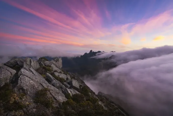 Framed Print : Sunset and fog flow over Federation Peak and the Eastern Arthur Range from the summit of Framed Print : Sunset and fog flow over Federation Peak and the Eastern Arthur Range from the summit of