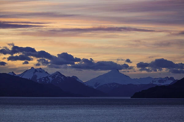 Sunset with Mountain Ranges Along Strait of Magellan, in South Americas Southern Tip