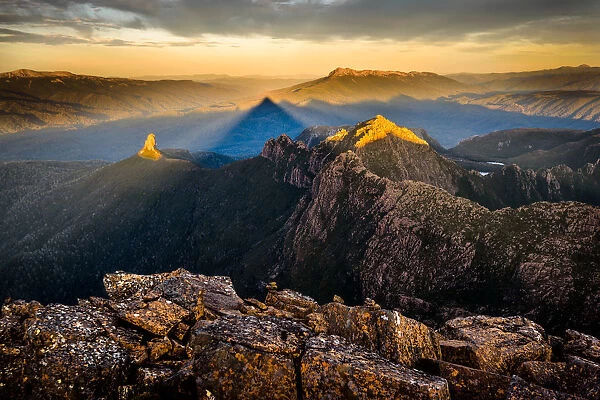 Sunset at the top of mt Anne in Southwest Tasmania. View to Lots Wife and Lighting Ridge