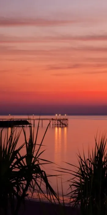 Framed Print : Sunset over Night cliff Jetty