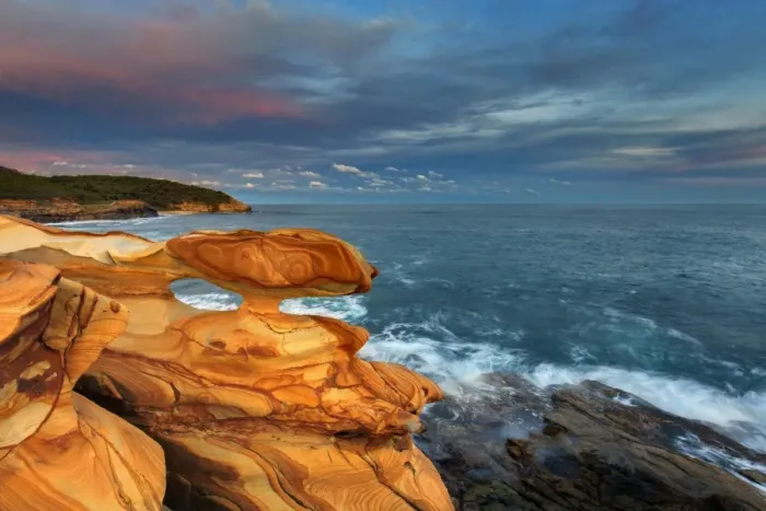 Framed Print : Sunset over spectacular coastal rocks