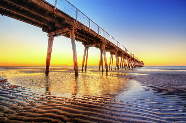 Sunset View of Largs Bay Jetty on the Lefevre Peninsula in the west of Adelaide, South Australia