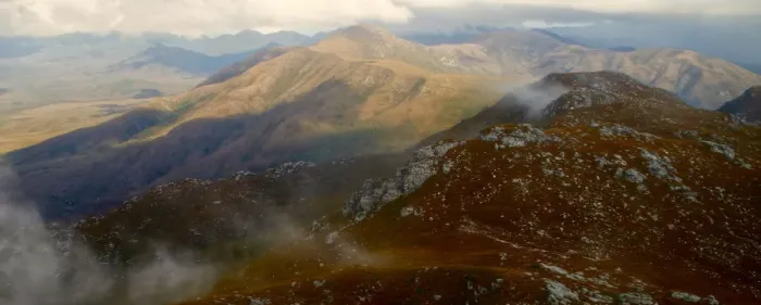 Framed Print : Tasmanian high mountain peaks in clouds