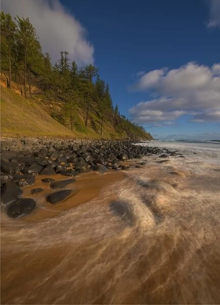 Tidal wash along the coastline of Anson bay, Norfolk Island
