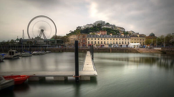 Torquay harbour pier and old town with city wheel