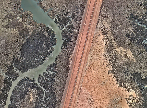 Train tracks crossing an estuary