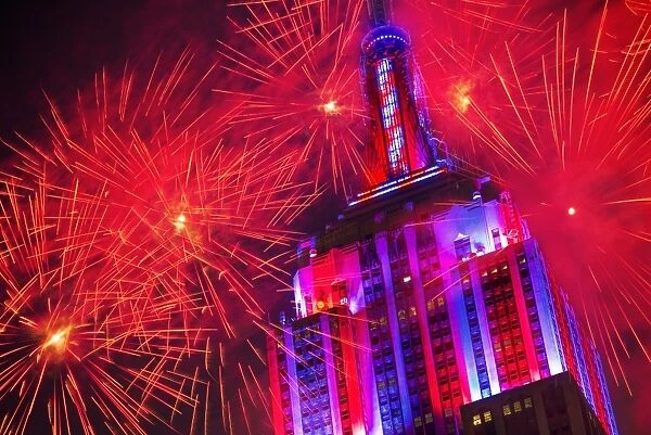USA, New York City, Empire state building with firework display