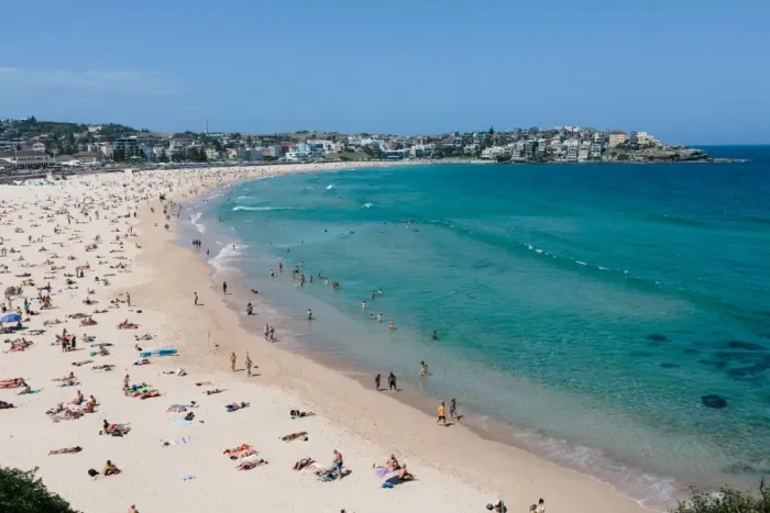 Framed Print : A view of Bondi beach and sunbathers on a bright sunny day Framed Print : A view of Bondi beach and sunbathers on a bright sunny day