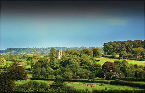 View across the countryside and a small village in Somerset, England, United kingdom