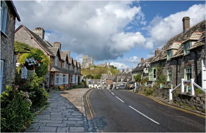 Framed Print : A view down the high Street of Corfe Castle, Isle of Purbeck, Dorset, England Framed Print : A view down the high Street of Corfe Castle, Isle of Purbeck, Dorset, England