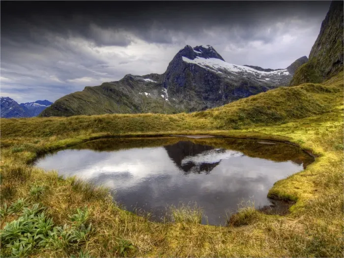 Framed Print : The view at Mackinnon Pass, high up in the mountainous region of the Fiordland National Park, Southland, south island, New Zealand