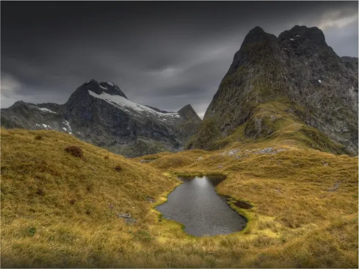 Framed Print : The view at Mackinnon Pass, high up in the mountainous region of the Fiordland National Park, Southland, south island, New Zealand Framed Print : The view at Mackinnon Pass, high up in the mountainous region of the Fiordland National Park, Southland, south island, New Zealand