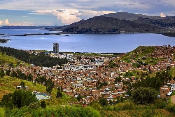 View of Puno and Lake Titicaca, Puno, Peru, South America