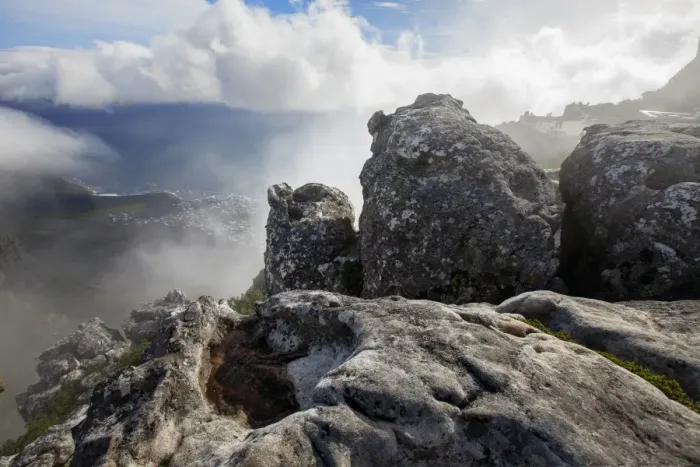 Framed Print : View of Table Bay with Passing Clouds and a Rock Pool and Some Rock Formations in the Foreground From The Top of Table Mountain, Cape Town, South Africa