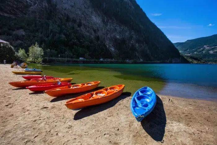 Framed Print : View of Three Valley Lake in Three Valley Gap with a Row of Canoes on the Trans-Canada Highway, British Columbia, Canada