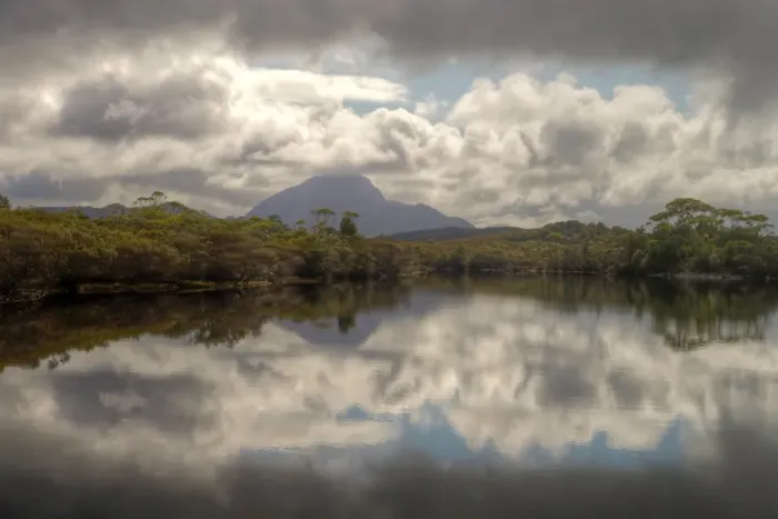 Framed Print : Still water mountain, trees and clouds reflections Framed Print : Still water mountain, trees and clouds reflections