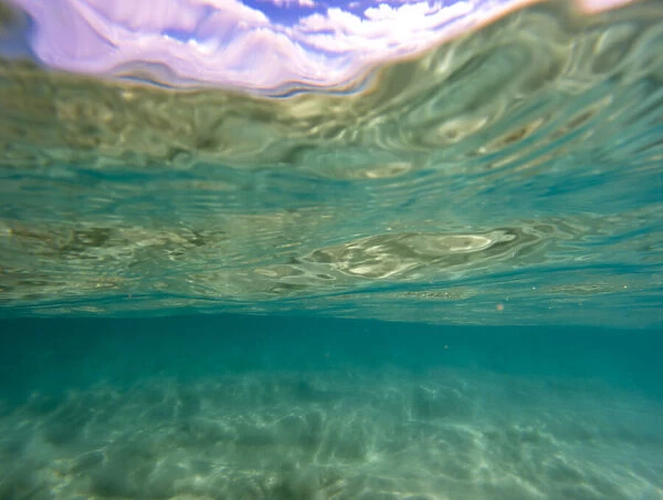 Water patterns from underneath the wave, looking up to the ocean surface