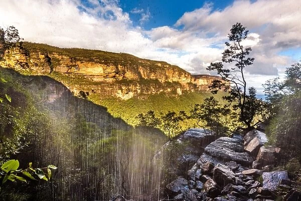 Behind the waterfall at Valley of the Waters in New South Wales Blue Mountains