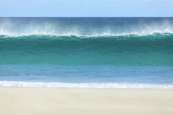 Wave breaking onto a beach. Sleaford Bay. Eyre Peninsula. South Australia