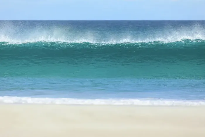 Framed Print : Wave breaking onto a beach. Sleaford Bay. Eyre Peninsula. South Australia