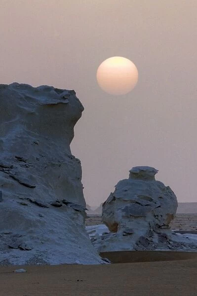 White desert sunset over limestone formations