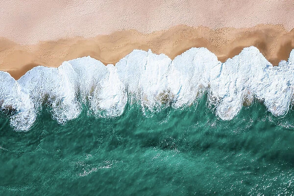 White waves washing the beach