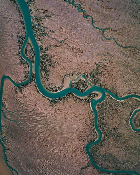 Winding river channel at low tide as seen from drones point of view, Lincolnshire