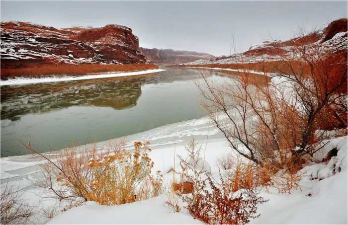 Framed Print : A winter mantle of snow lies along the banks of the Colorado river near Moab in Utah Framed Print : A winter mantle of snow lies along the banks of the Colorado river near Moab in Utah