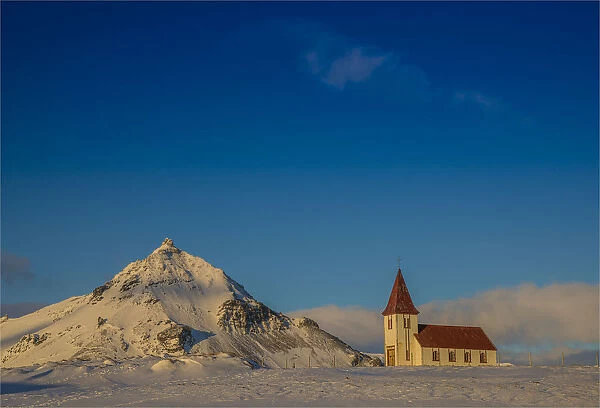 Winter scene and historic church, Arnarstapi, Snaefellness, Iceland