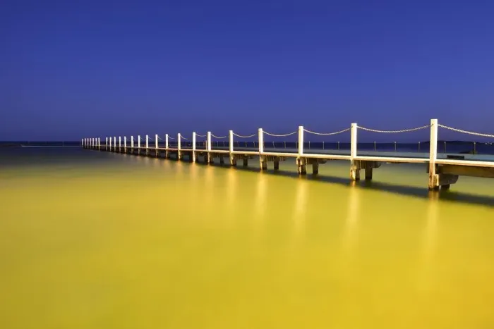 Framed Print : Wooden Bridge and Pool after Sunset