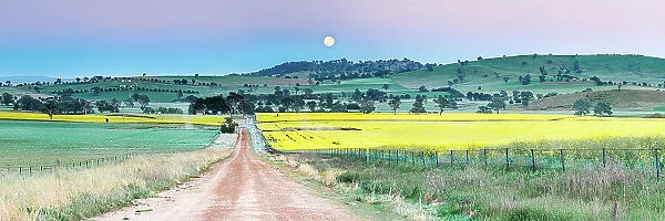 Woodstock. A full moon rises over the small farming community of Woodstock in country NSW