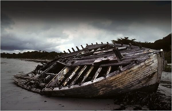 Wrecked fishing boat on the beach at Killiecrankie, Flinders Island, Bass Strait, Tasmania, Australia