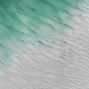 Abstract drone image at the edge of a sandbar in Willie Creek estuary, The Kimberley, Western Australia, Australia Abstract drone image at the edge of a sandbar in Willie Creek estuary, The Kimberley, Western Australia, Australia