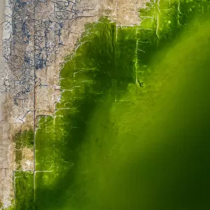 Abstract drone shot of a gas plant tailing pond, Western Australia