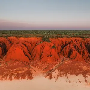 Aerial image in front of sandstone cliffs at sunset, James Price Point, The Kimberley, Western Australia, Australia