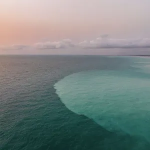 Aerial photo showing a water confluence in the Indian Ocean, The Kimberley, Western Australia, Australia Aerial photo showing a water confluence in the Indian Ocean, The Kimberley, Western Australia, Australia
