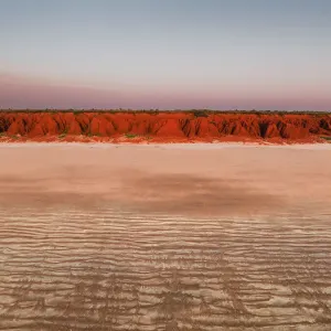 Aerial photograph in front of sandstone cliffs at sunset, James Price Point, The Kimberley, Western Australia, Australia