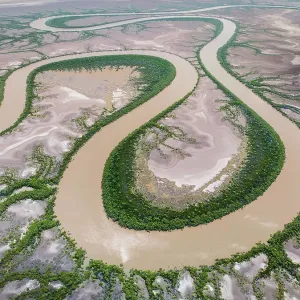 Aerial shot showing the King River meandering over a floodplain, The Kimberley, Western Australia, Australia