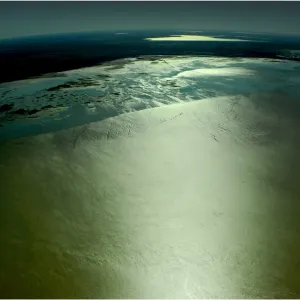 An Aerial view of the Australian outback in flood around Lake Eyre, showing the vibrant colours of the Landscape