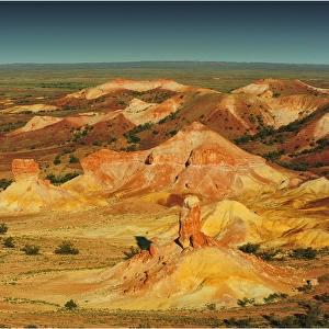 An Aerial view of the Australian outback over the Painted desert, showing the vibrant colours of the Landscape