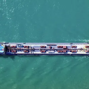 Aerial top view of a cargo container ship - transportation, import, export, logistics, commodity business in open sea