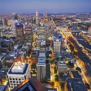Aerial view of the city centre of Melbourne illuminated at dusk